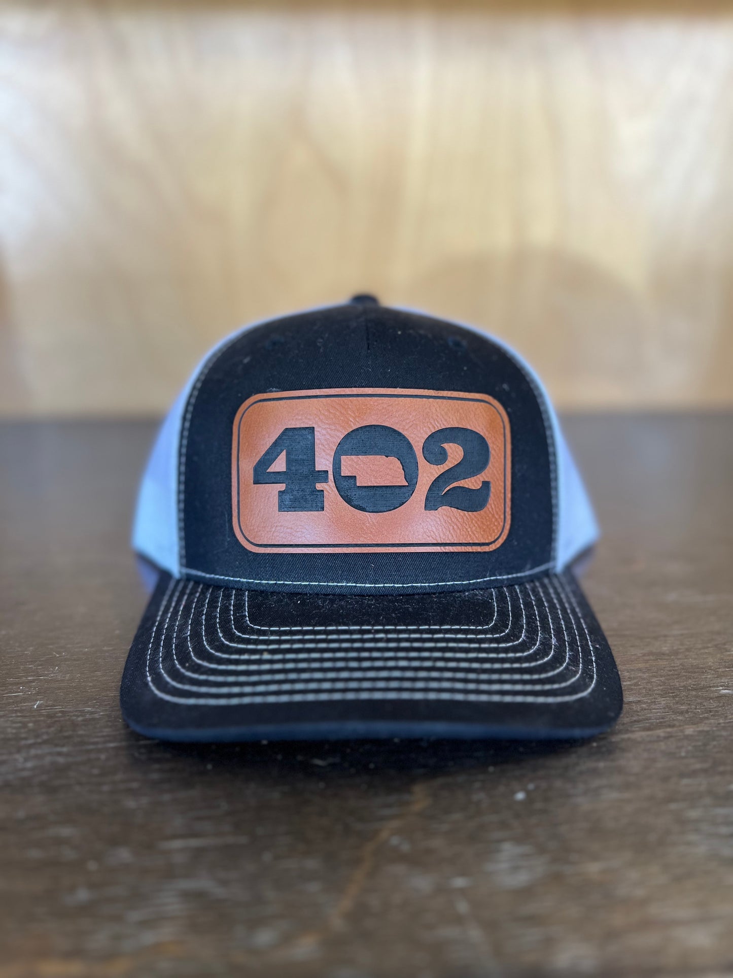 402 Leather Patch 7 Panel Trucker Hat