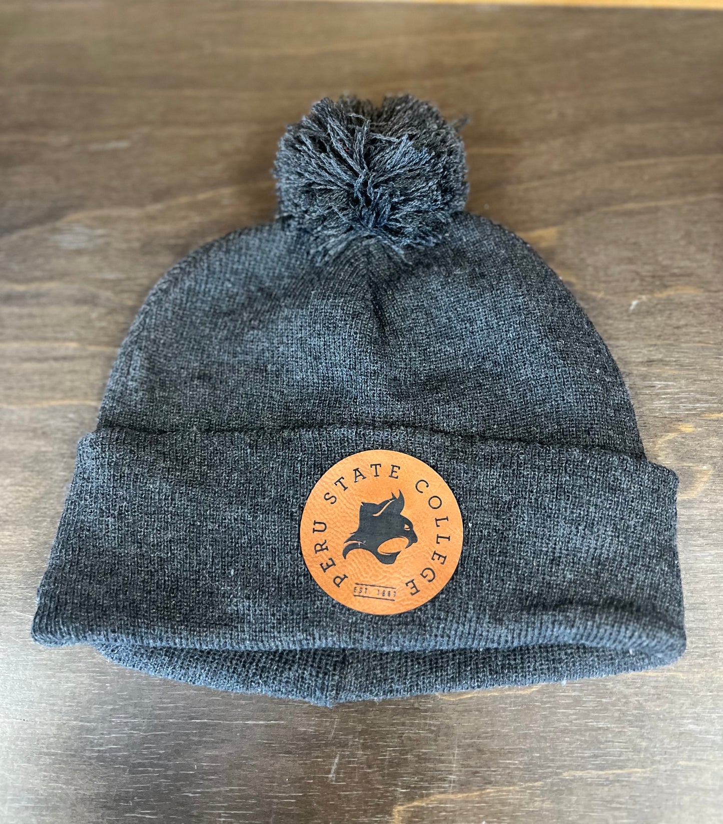 Peru State College Leather Patch Pom Pom Beanie