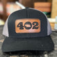 402 Leather Patch 7 Panel Trucker Hat