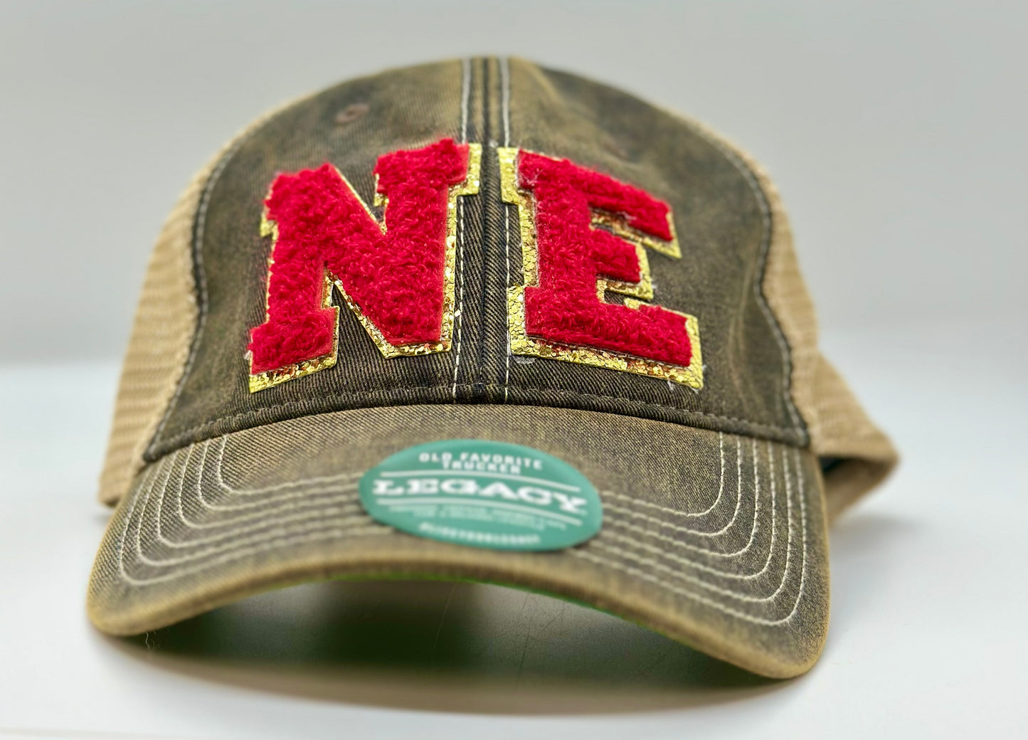 NE Chenille Letter Unstructured Trucker Hat